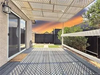 a view of a balcony with door