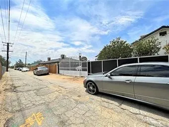 a view of car parked on the road
