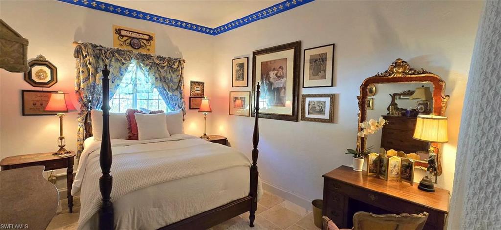 Undisclosed Address Naples, FL 34104 - Photo 31 of 40 Bedroom featuring baseboards