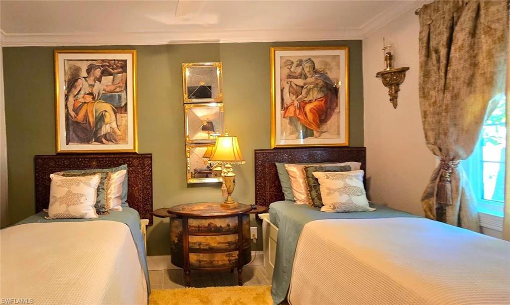 Undisclosed Address Naples, FL 34104 - Photo 36 of 40 Bedroom with crown molding