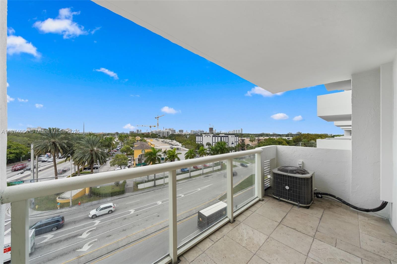 13499 Biscayne Boulevard, Unit 503 North Miami, FL 33181 - Photo 2 of 22 a view of an outdoor seating and city view