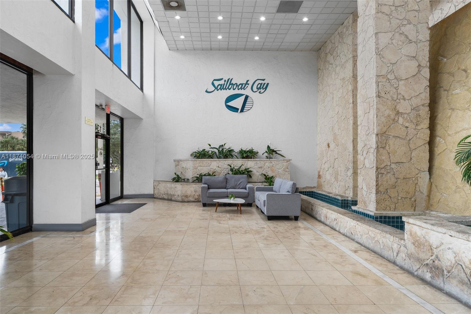 13499 Biscayne Boulevard, Unit 503 North Miami, FL 33181 - Photo 5 of 22 a living room with furniture