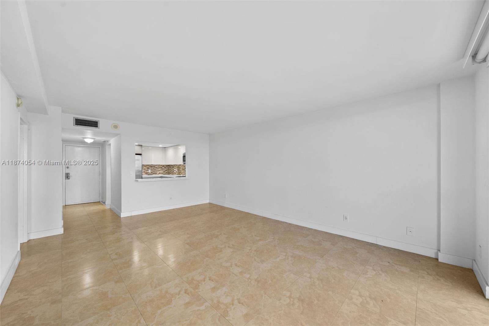 13499 Biscayne Boulevard, Unit 503 North Miami, FL 33181 - Photo 10 of 22 a view of a big room with closet and windows