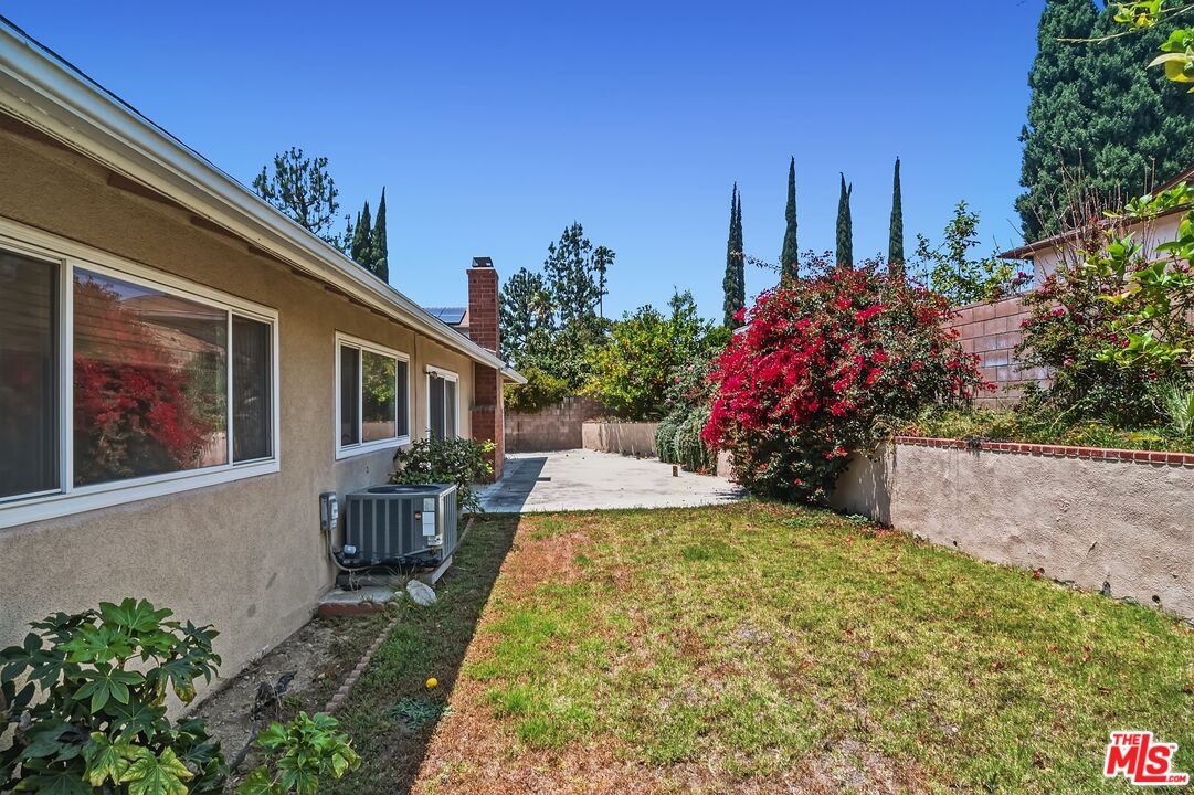 19131 Tulsa Street Porter Ranch, CA 91326 - Photo 40 of 43 a view of a house with backyard and sitting area