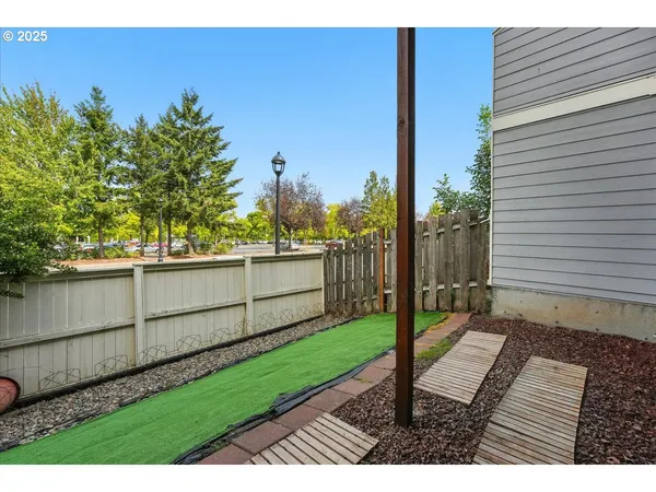 a view of a backyard with a garden