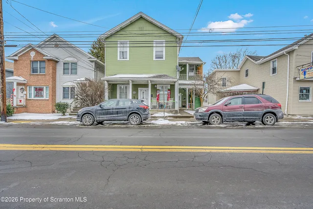 a car parked in front of a house