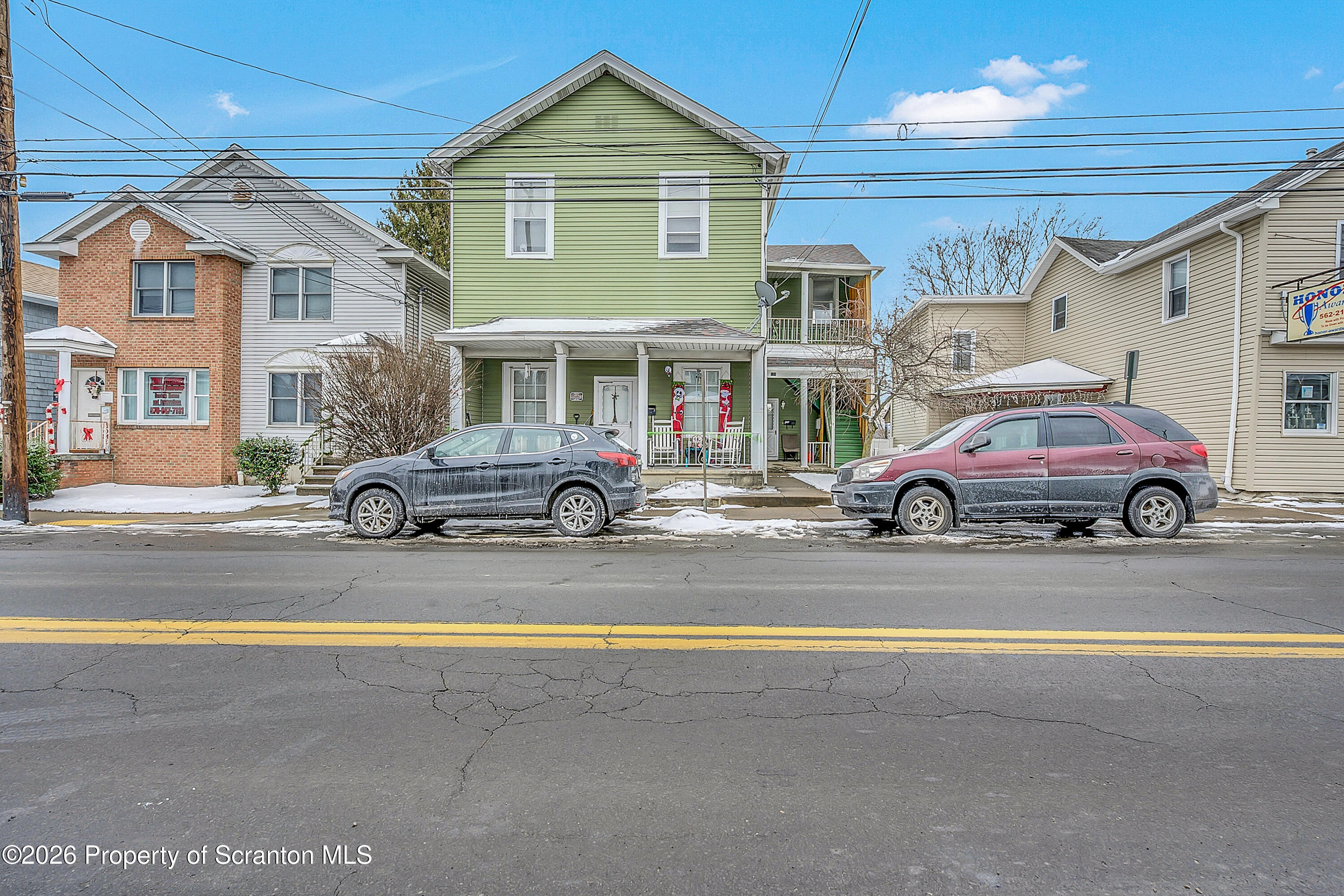 a car parked in front of a house