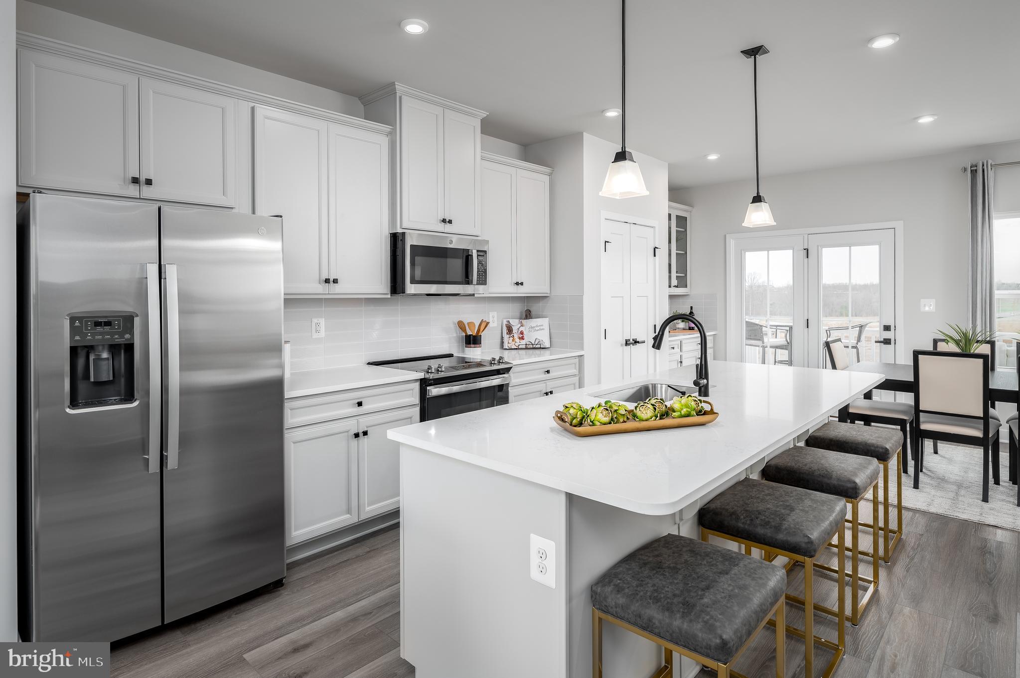 8603 Branch Side Way, Unit B Brandywine, MD 20613 - Photo 12 of 33 MIAN LEVEL KITCHEN W/WHITE LINEN CABINETS