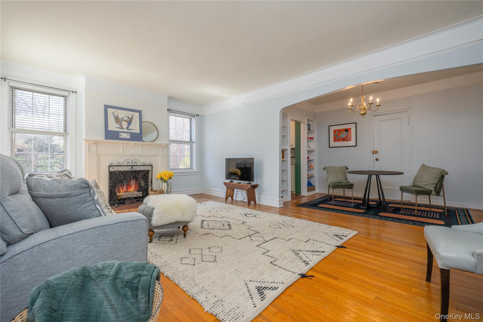 25 Parkview Avenue, Unit 2K Bronxville, NY 10708 - Photo 14 of 26 a living room with furniture and a fireplace