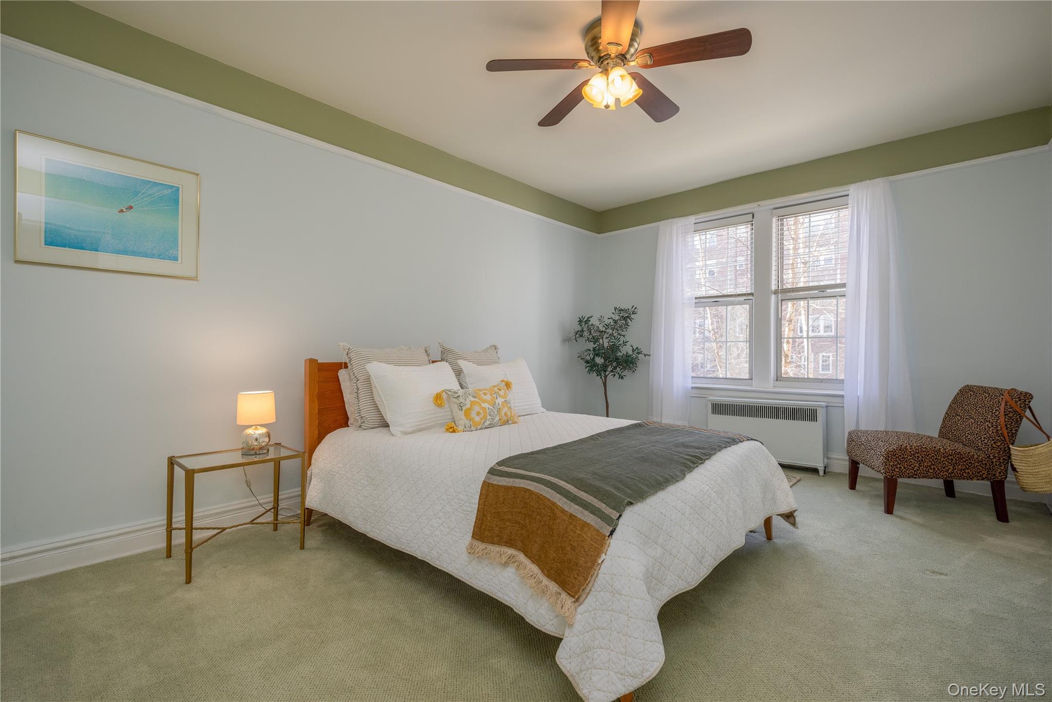 25 Parkview Avenue, Unit 2K Bronxville, NY 10708 - Photo 25 of 26 a bedroom with a bed couch and window