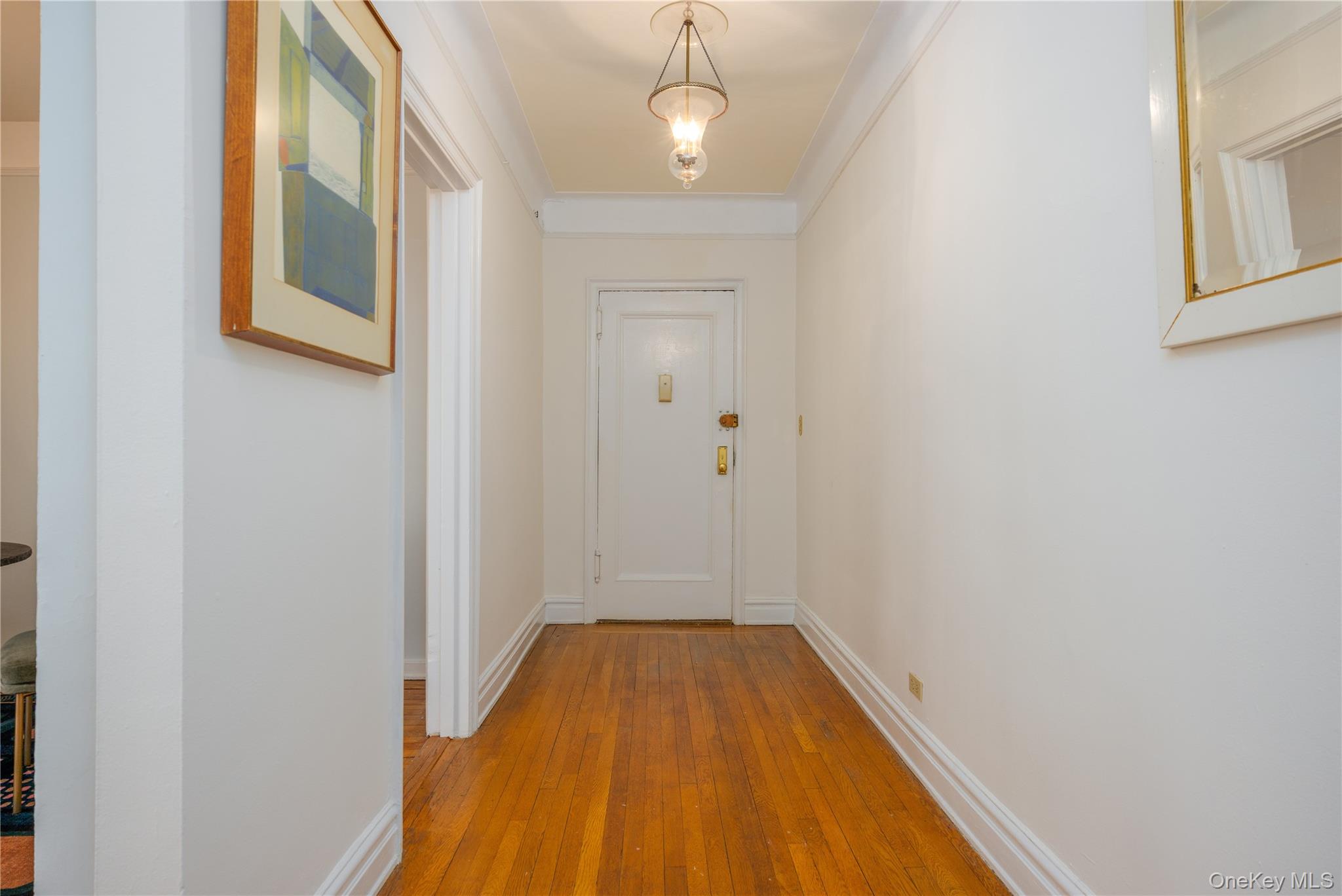 25 Parkview Avenue, Unit 2K Bronxville, NY 10708 - Photo 10 of 26 a view of a hallway with wooden floor