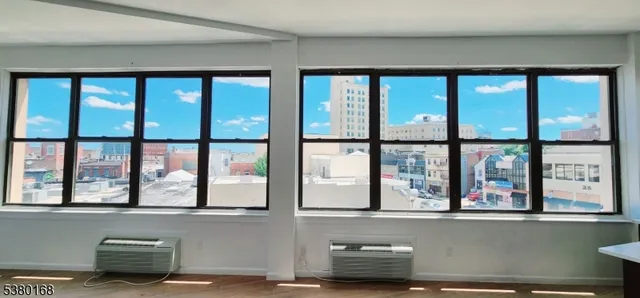 a kitchen with a sink a stove and refrigerator