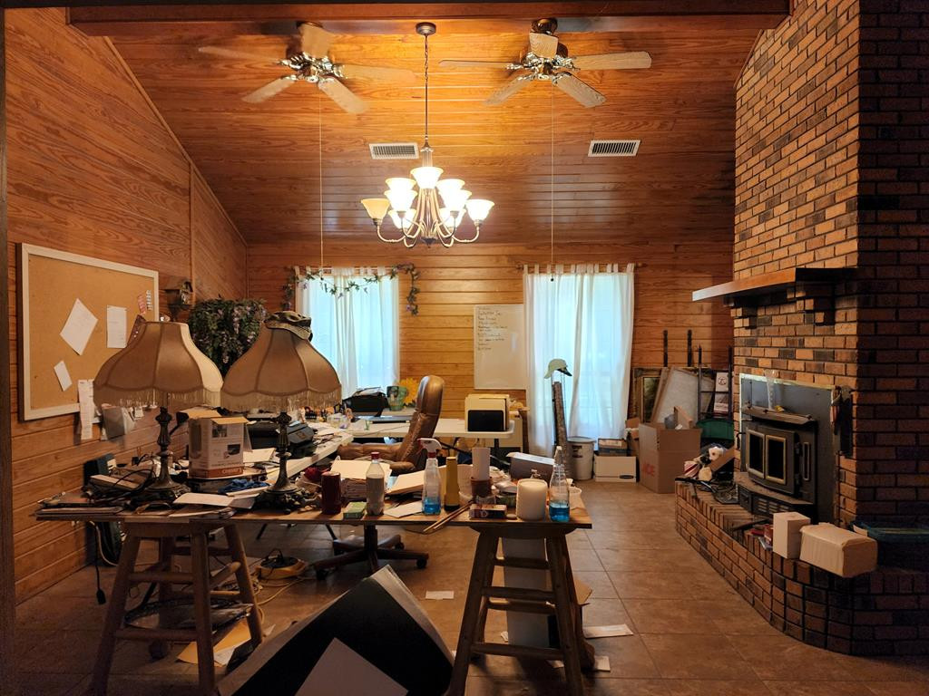53 Low Water Bridge Road Natchez, MS 39120 - Photo 8 of 14 Living/Dining Fireplace