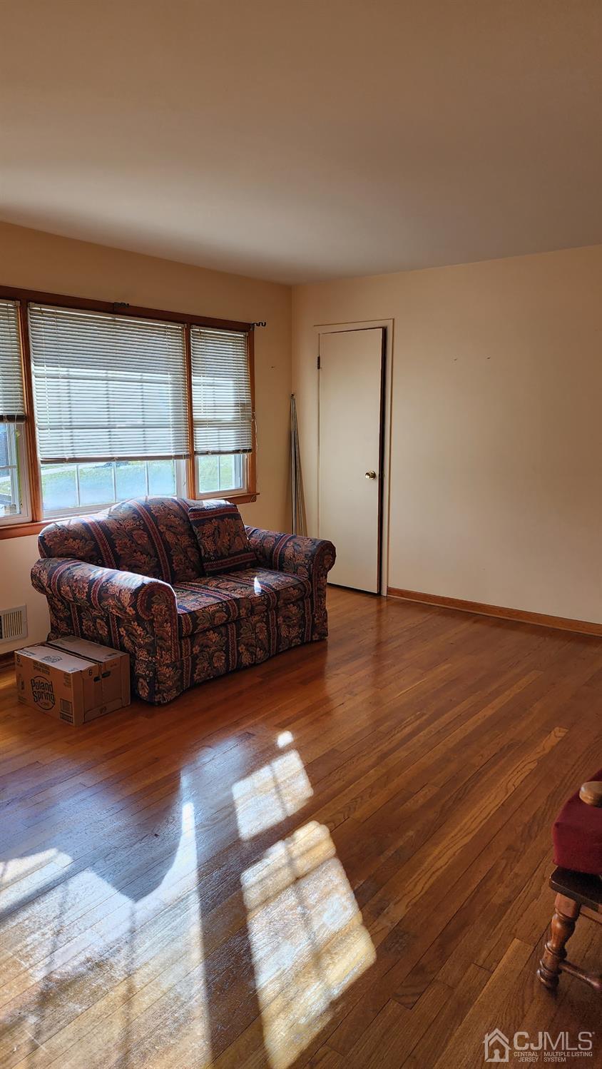 20 Middlesex Avenue Edison, NJ 08820 - Photo 16 of 28 a living room with furniture window and wooden floor