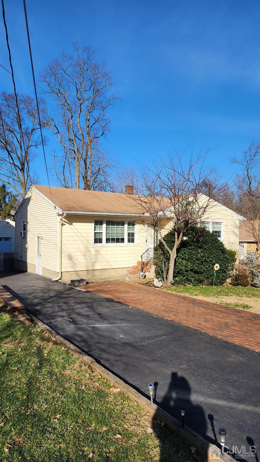 20 Middlesex Avenue Edison, NJ 08820 - Photo 2 of 28 a front view of a house with a yard