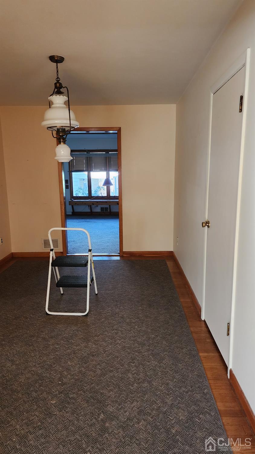 20 Middlesex Avenue Edison, NJ 08820 - Photo 21 of 28 a room with a table and a piano