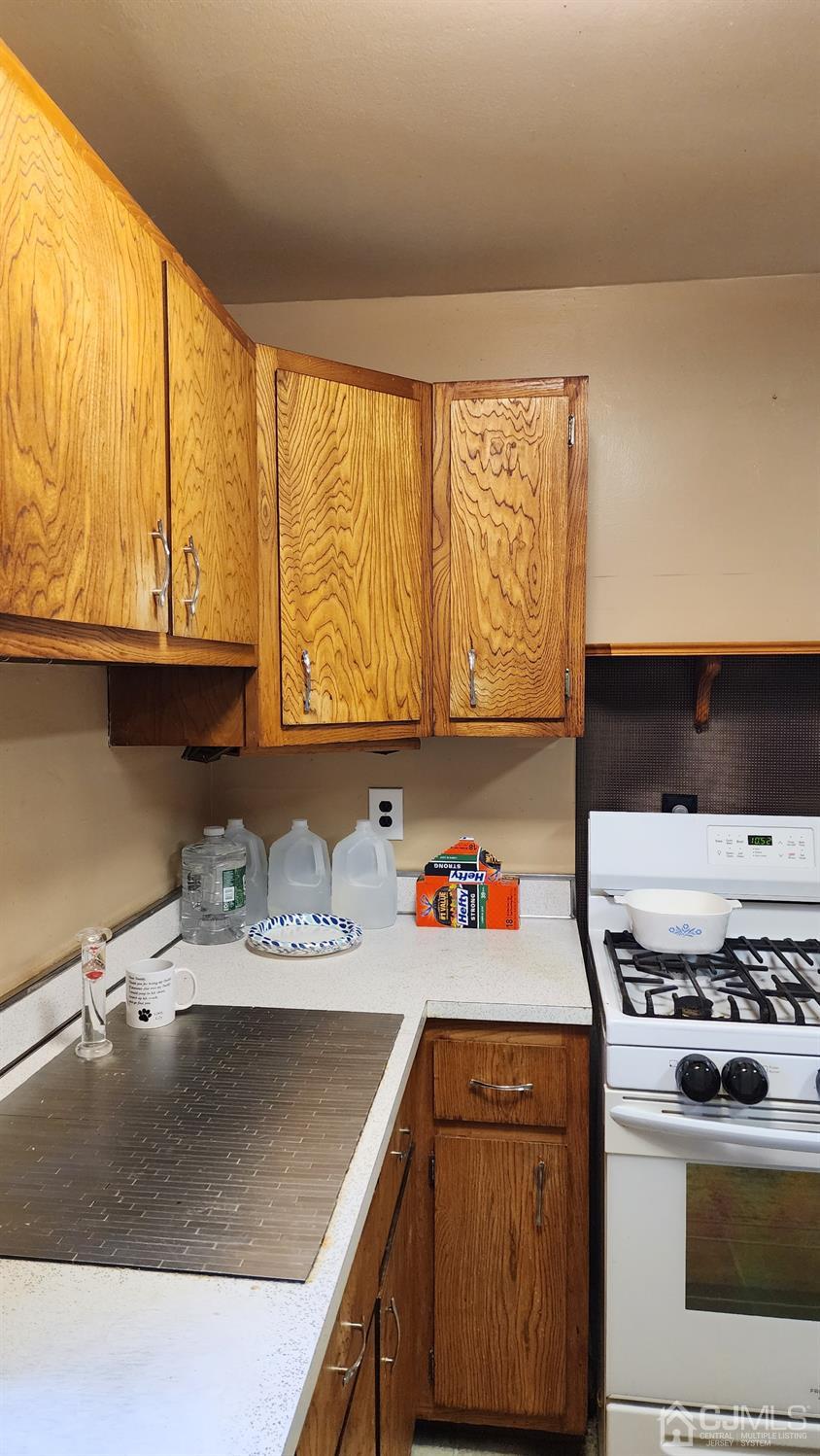 20 Middlesex Avenue Edison, NJ 08820 - Photo 24 of 28 a kitchen with stainless steel appliances granite countertop a sink stove and cabinets