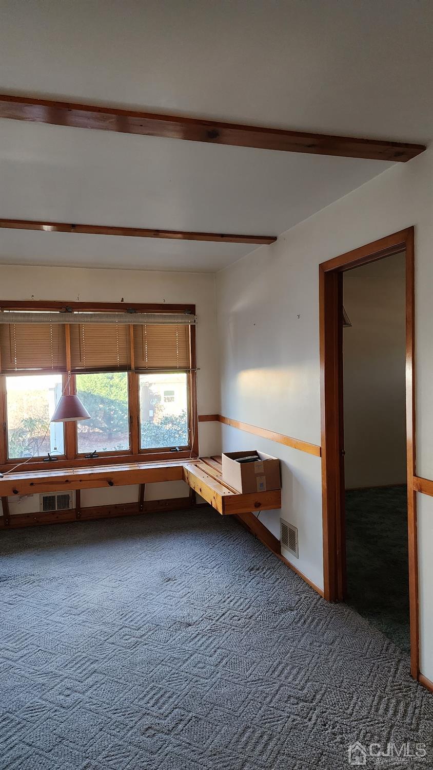 20 Middlesex Avenue Edison, NJ 08820 - Photo 5 of 28 a view of room with furniture and window