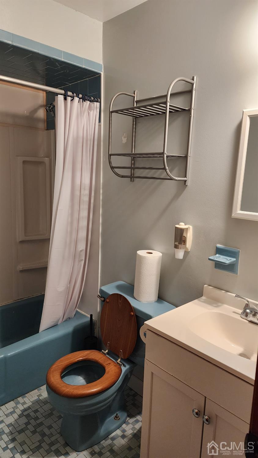 20 Middlesex Avenue Edison, NJ 08820 - Photo 8 of 28 a bathroom with a sink toilet and shower