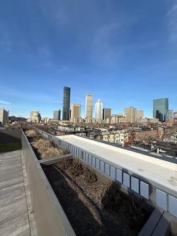 a view of city from a balcony