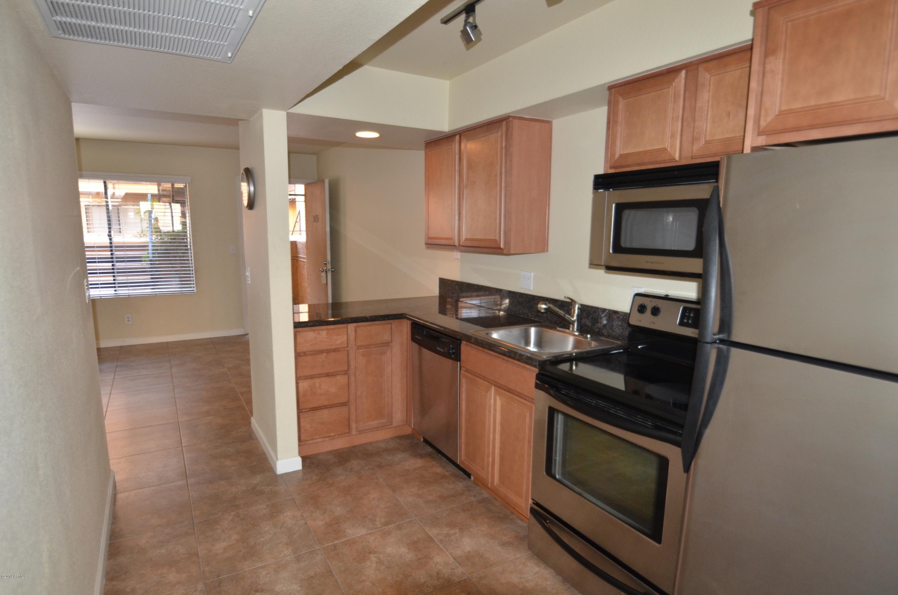 5401 East Thomas Road, Unit 1035 Phoenix, AZ 85018 - Photo 4 of 21 kitchen incl refrig & microwave