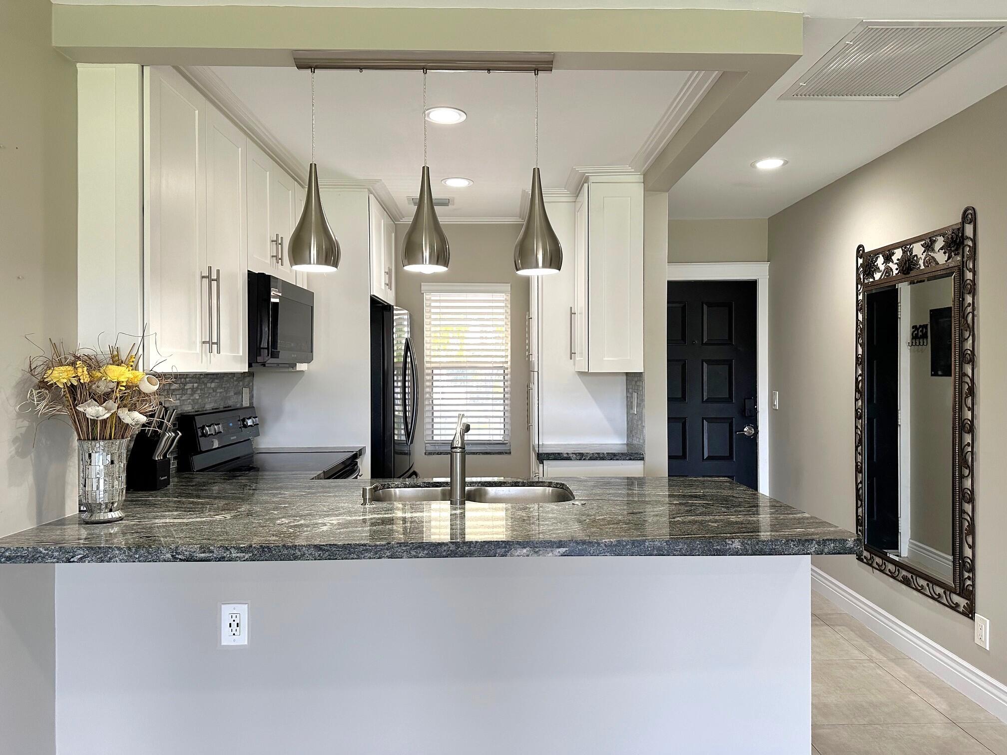 9845 Three Lakes Circle Boca Raton, FL 33428 - Photo 3 of 27 Kitchen