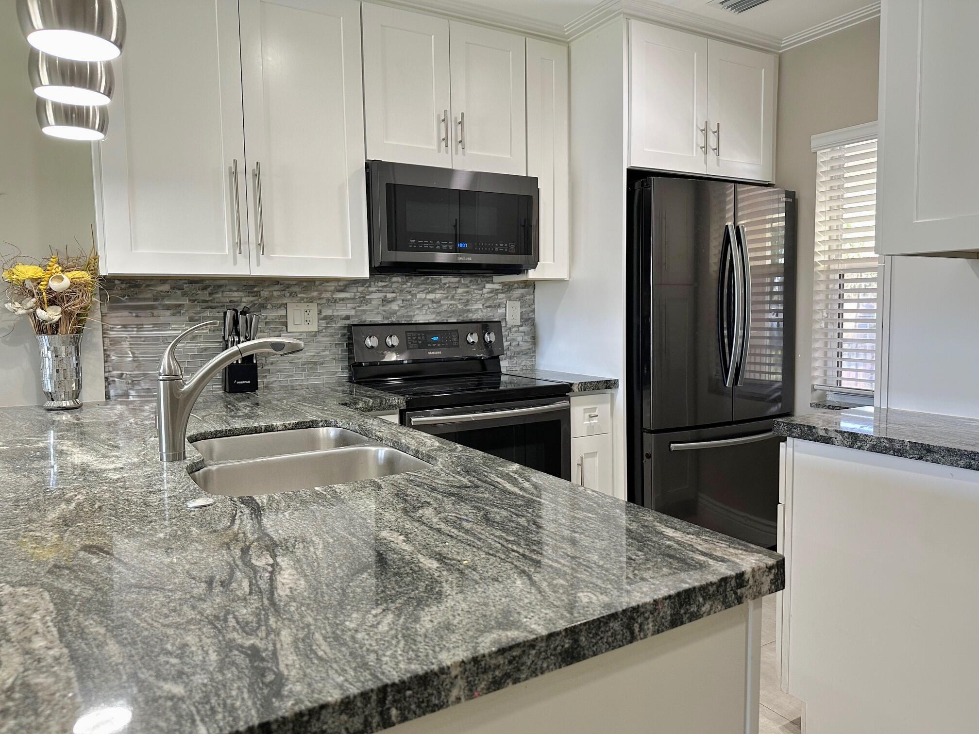 9845 Three Lakes Circle Boca Raton, FL 33428 - Photo 4 of 27 Kitchen