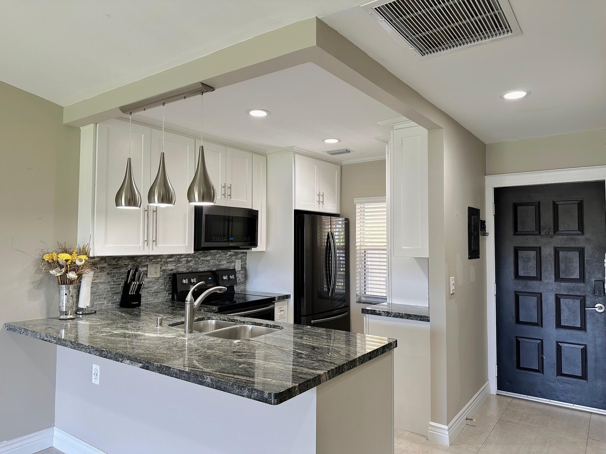 9845 Three Lakes Circle Boca Raton, FL 33428 - Photo 6 of 27 Kitchen