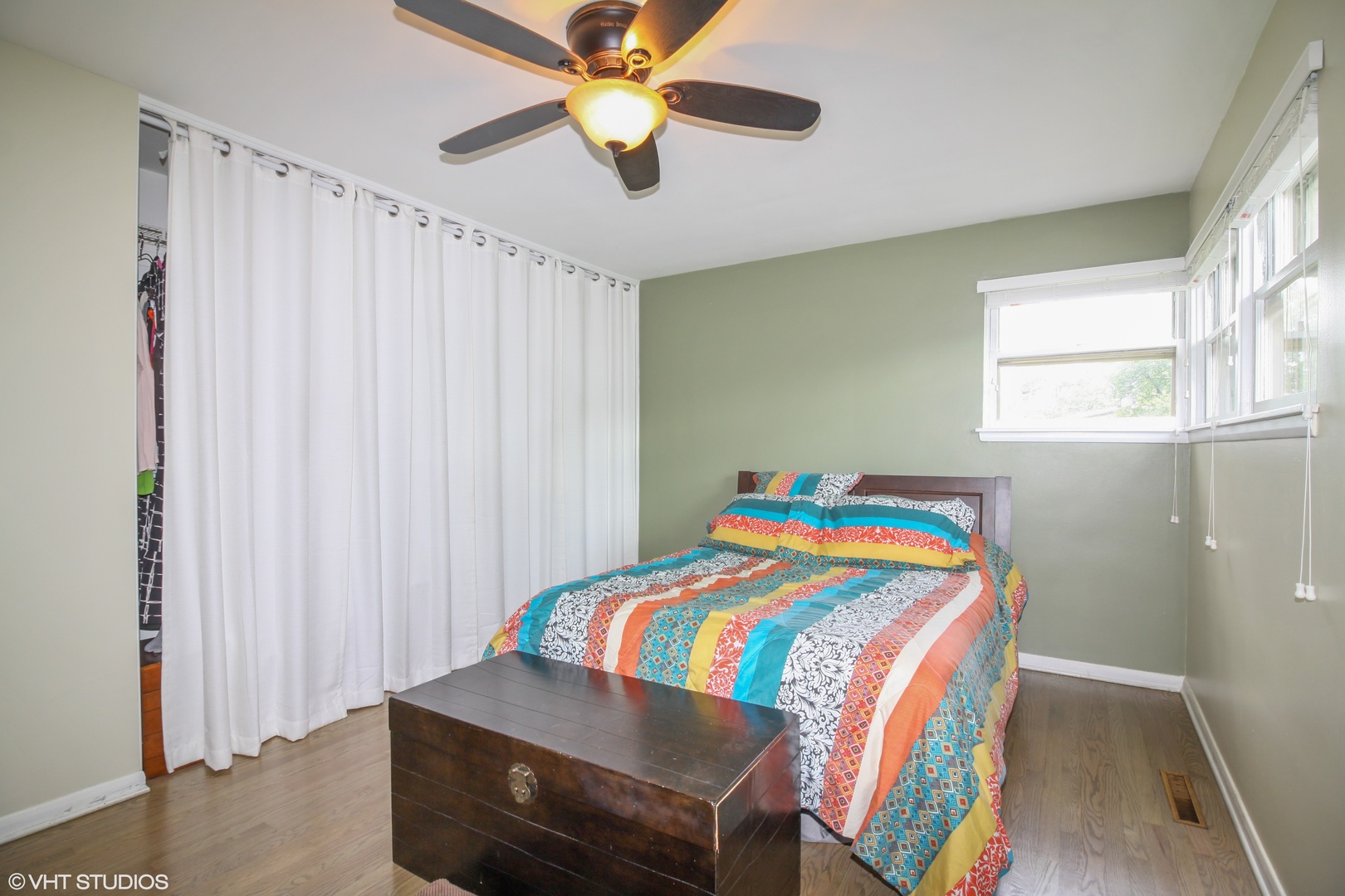 244 Glendale Road Glenview, IL 60025 - Photo 11 of 25 a bedroom with a bed and a chandelier