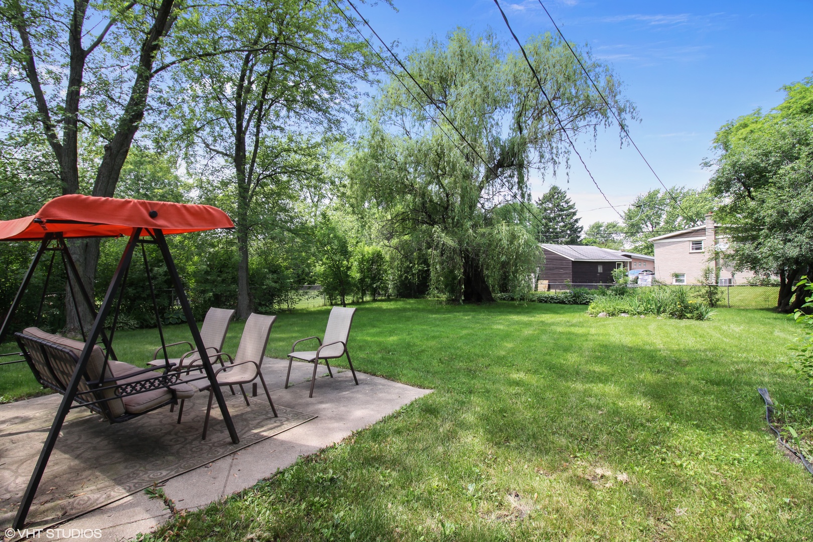 244 Glendale Road Glenview, IL 60025 - Photo 21 of 25 a view of backyard with seating and green space