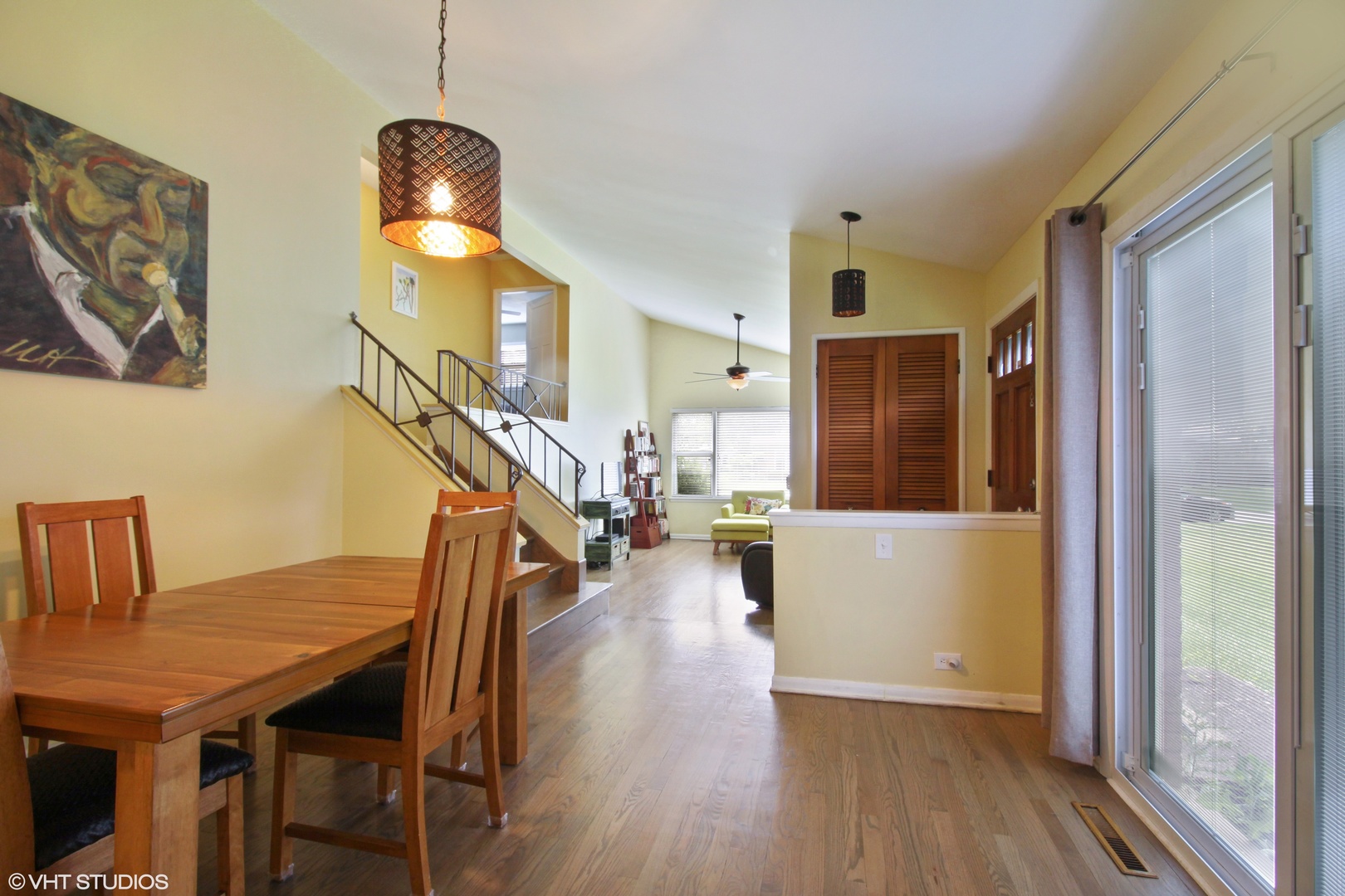 244 Glendale Road Glenview, IL 60025 - Photo 7 of 25 a view of a livingroom with furniture stairs wooden floor and windows