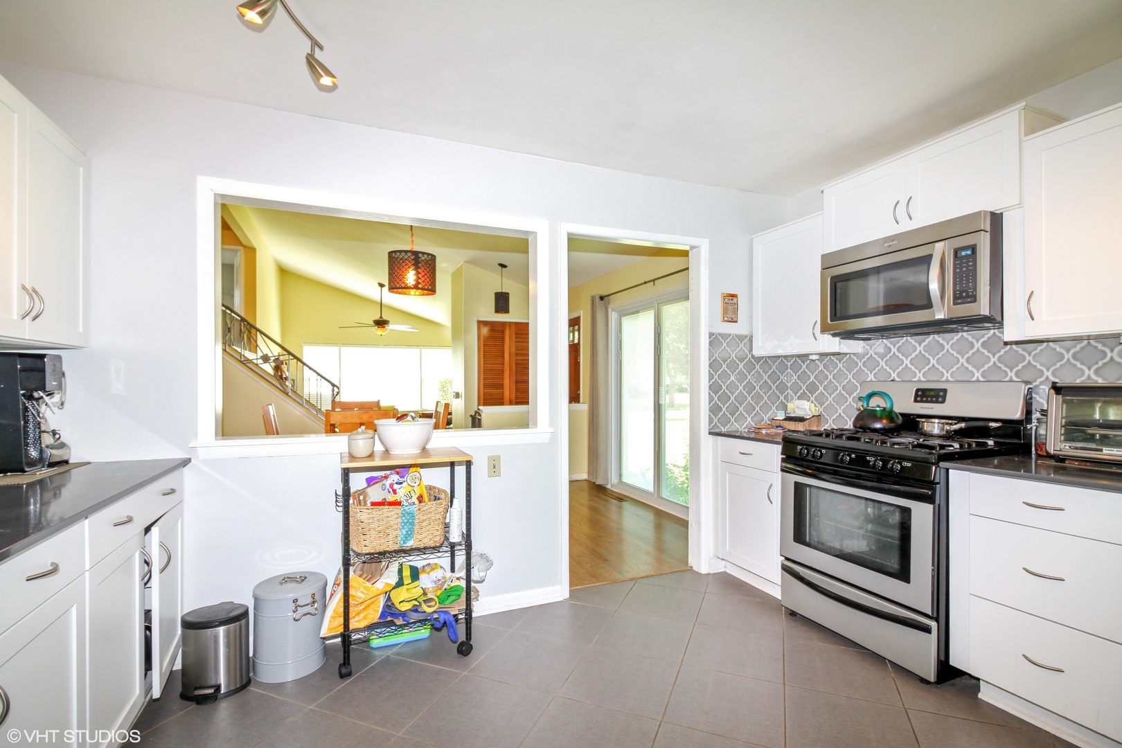 244 Glendale Road Glenview, IL 60025 - Photo 8 of 25 a kitchen with a stove and a microwave