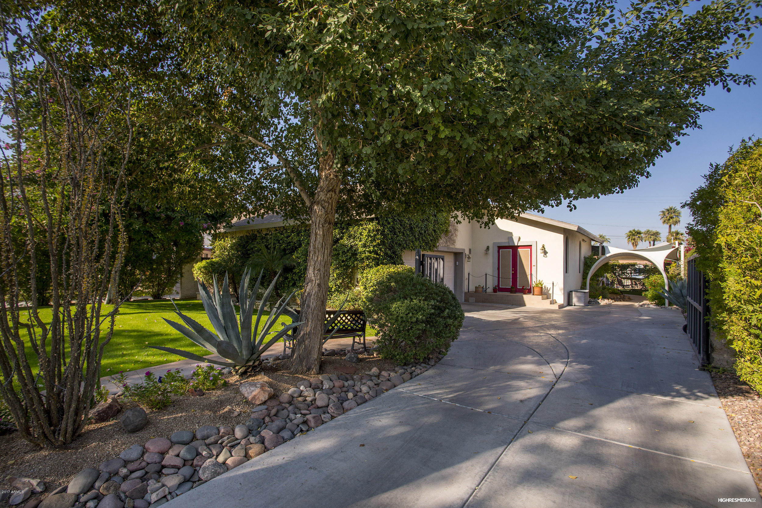 108 West Granada Road Phoenix, AZ 85003 - Photo 3 of 27 a front view of a house with garden