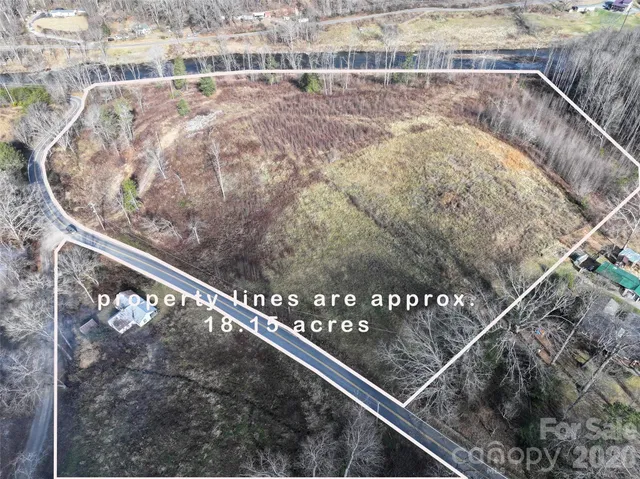 a view of a town with mountains