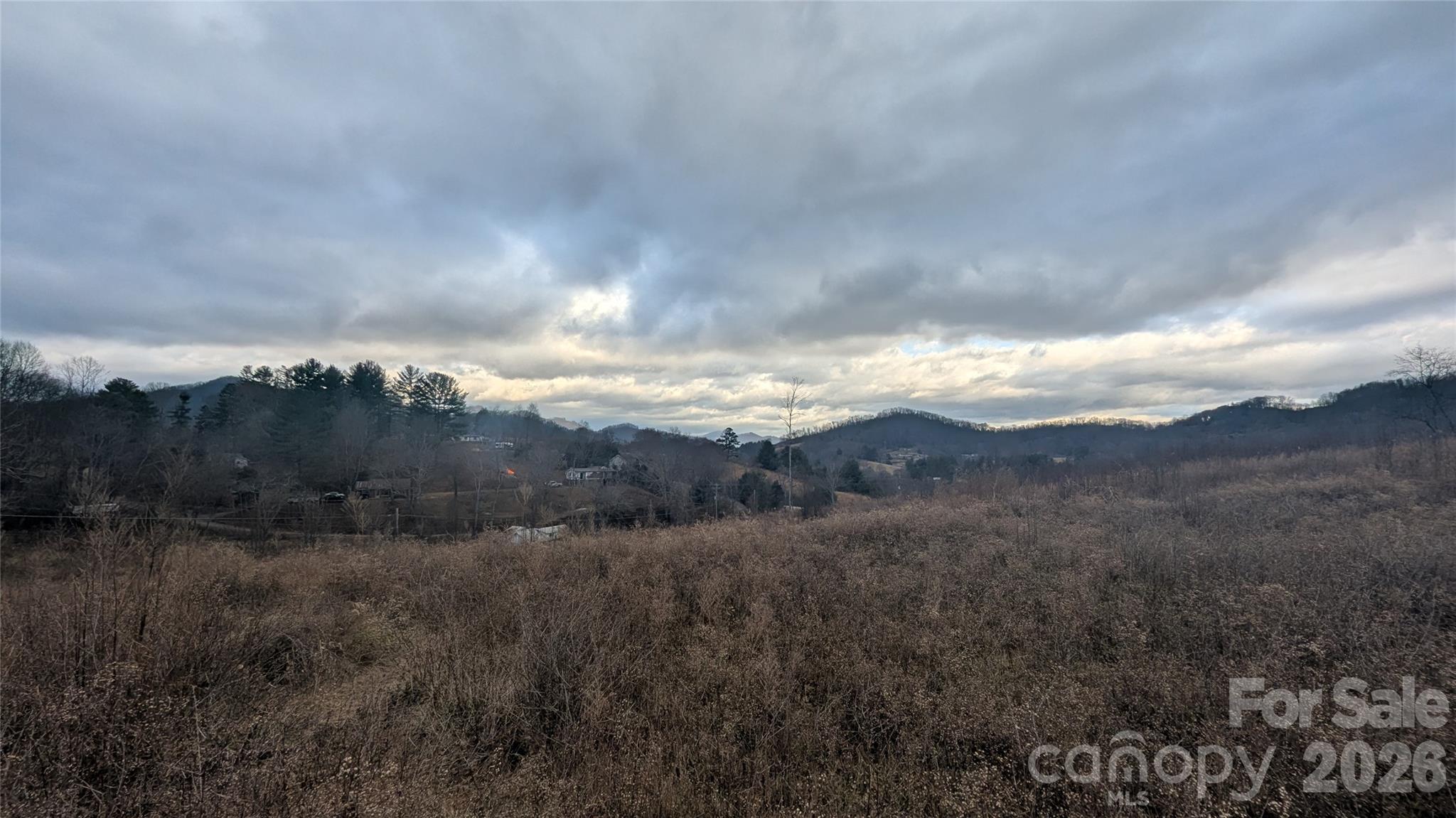 347 Richland Creek Road Clyde, NC 28721 - Photo 21 of 37 a view of a city and mountains