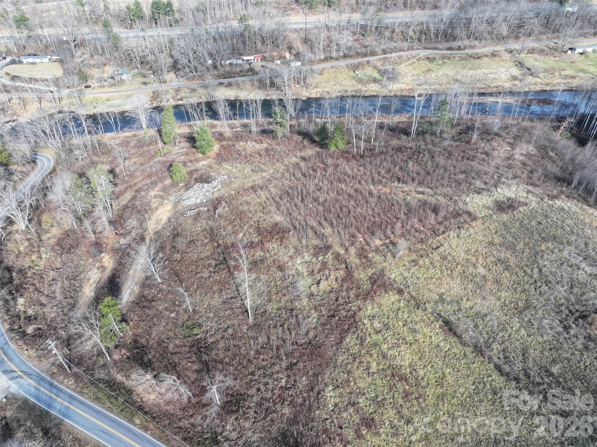 347 Richland Creek Road Clyde, NC 28721 - Photo 27 of 37 a view of a yard with an outdoor space