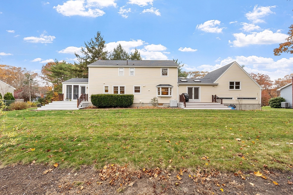 80 North Branch Road Concord, MA 01742 - Photo 2 of 35 a front view of a house with garden