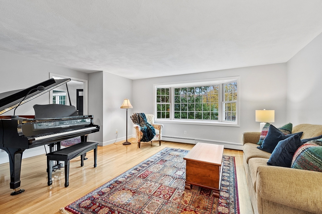 80 North Branch Road Concord, MA 01742 - Photo 6 of 35 a living room with furniture and a large window
