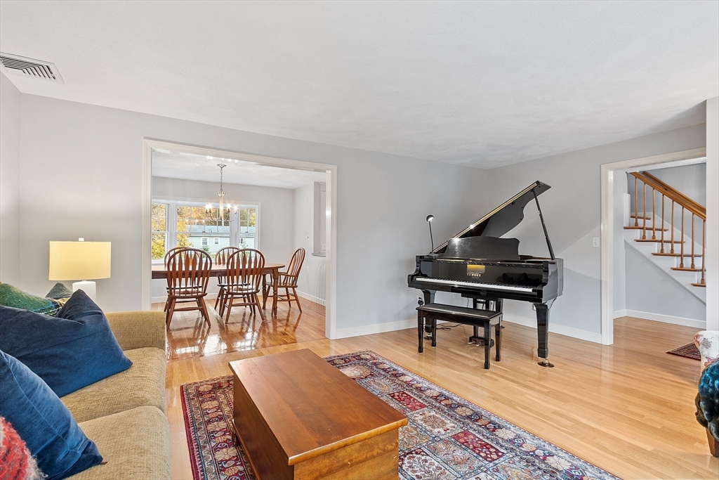 80 North Branch Road Concord, MA 01742 - Photo 7 of 35 a living room with furniture a rug and a wooden floor