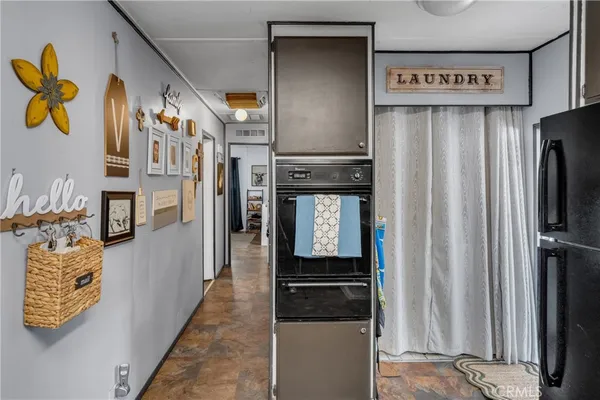 a hallway with storage and utility