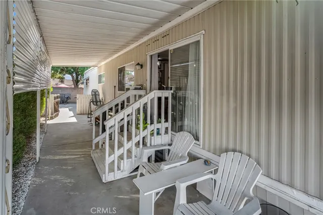 a view of balcony with furniture
