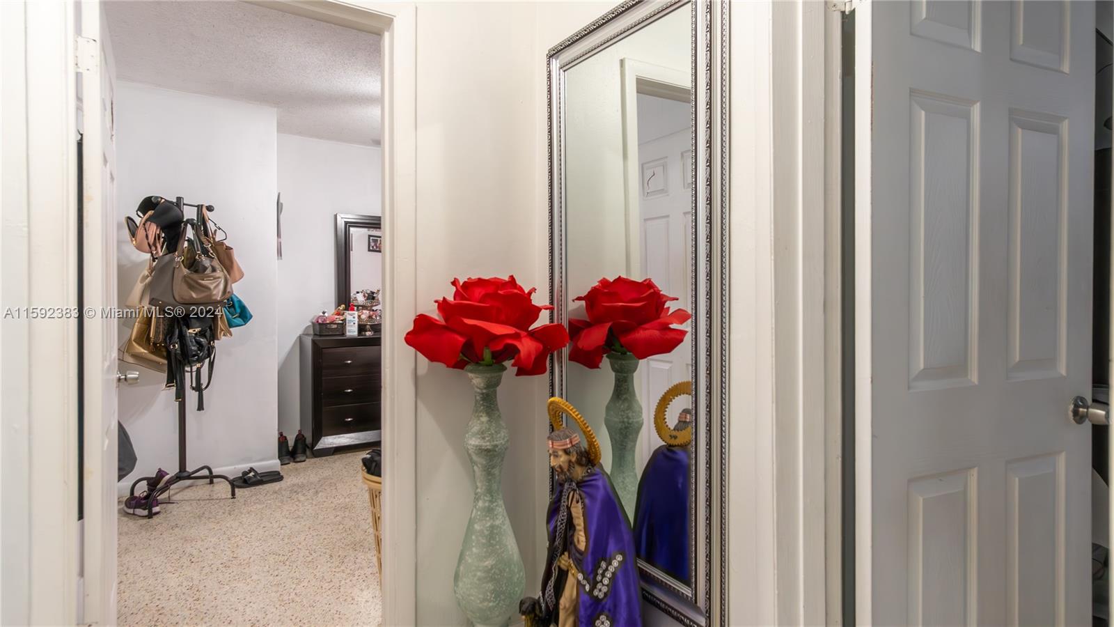 23 West 13th Street Hialeah, FL 33010 - Photo 34 of 54 a view of a entryway with a flower pot