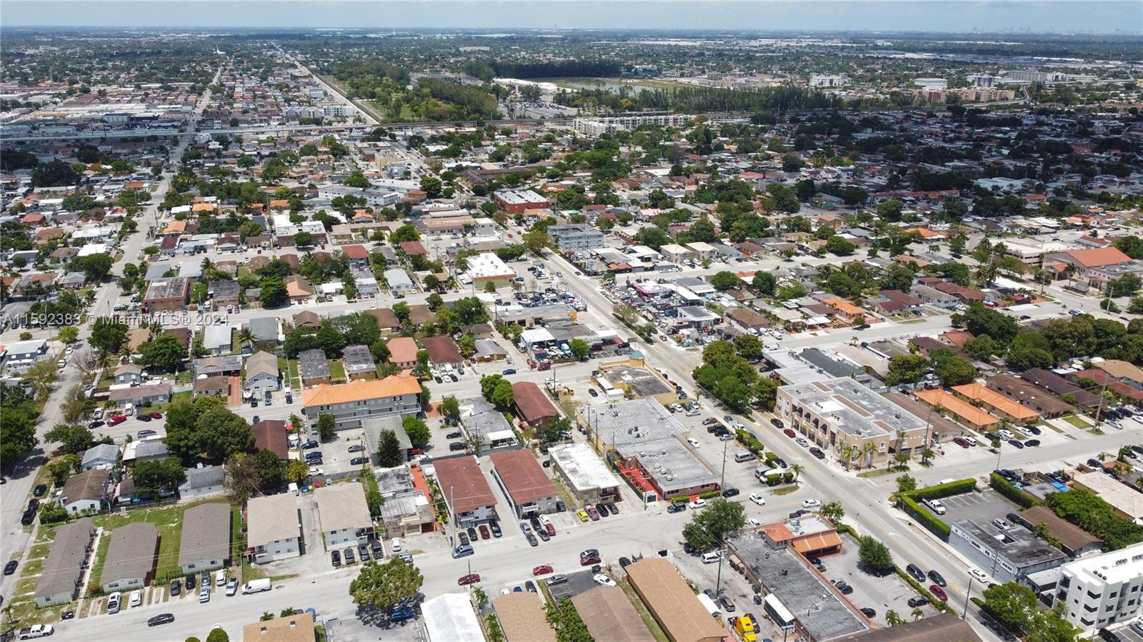 23 West 13th Street Hialeah, FL 33010 - Photo 52 of 54 an aerial view of residential houses with city view