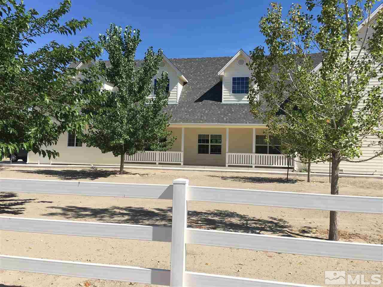 3950 Schindler Road Fallon, NV 89406 - Photo 1 of 24 a view of a house with snow on the road