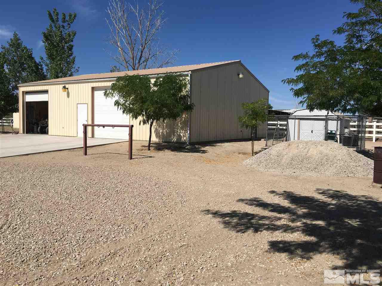 3950 Schindler Road Fallon, NV 89406 - Photo 3 of 24 a view of a house with a snow in the yard