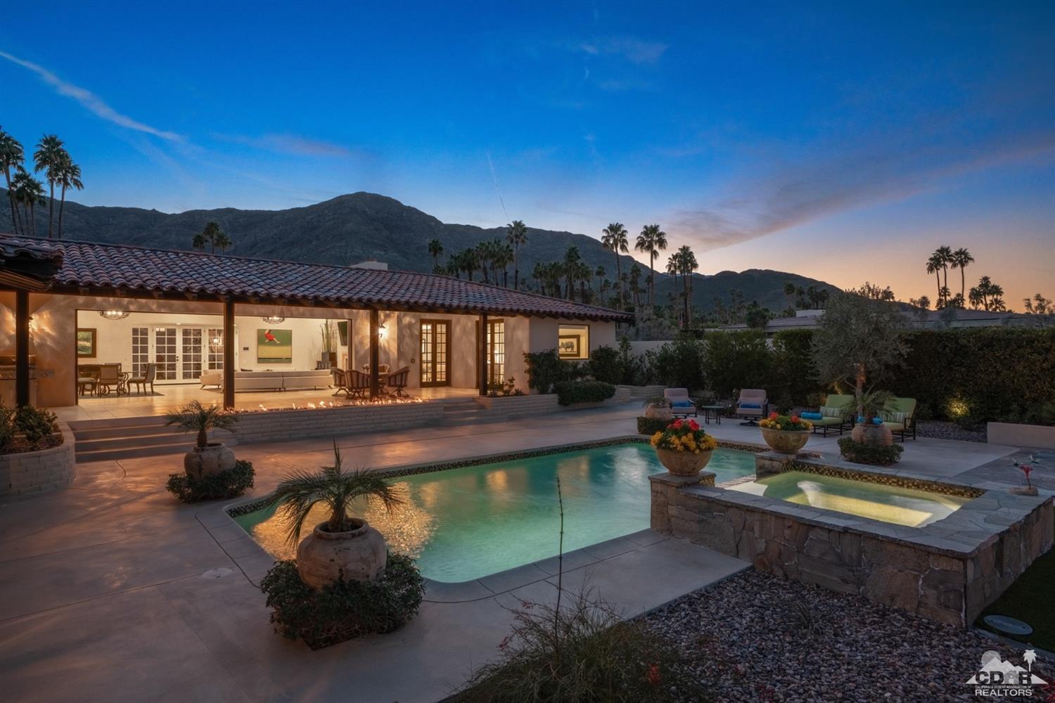 40757 Thunderbird Road Rancho Mirage, CA 92270 - Photo 12 of 70 a swimming pool with outdoor seating