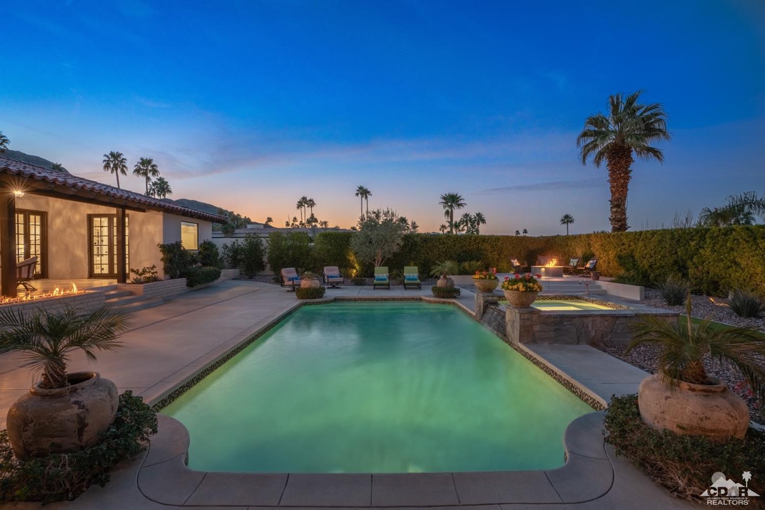 40757 Thunderbird Road Rancho Mirage, CA 92270 - Photo 13 of 70 a view of a swimming pool with outdoor seating