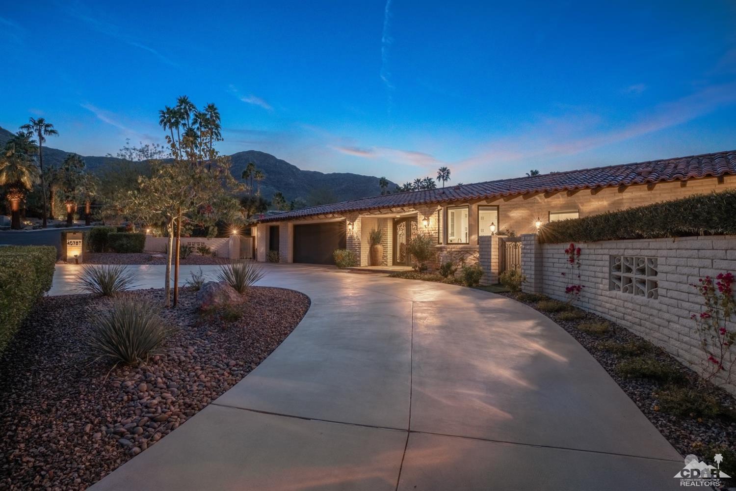40757 Thunderbird Road Rancho Mirage, CA 92270 - Photo 14 of 70 a view of a house with a yard