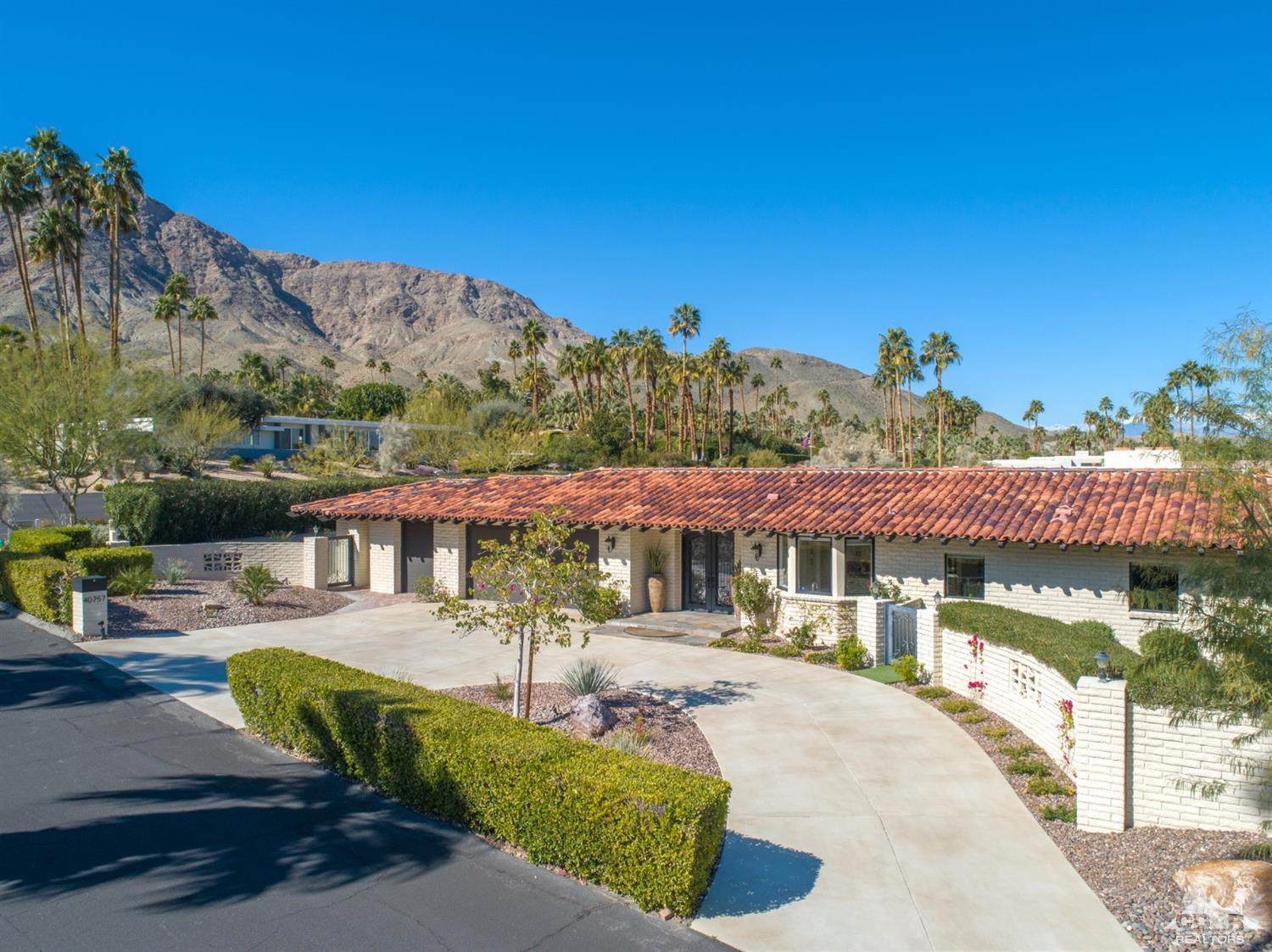 40757 Thunderbird Road Rancho Mirage, CA 92270 - Photo 15 of 70 a view of a swimming pool with a patio