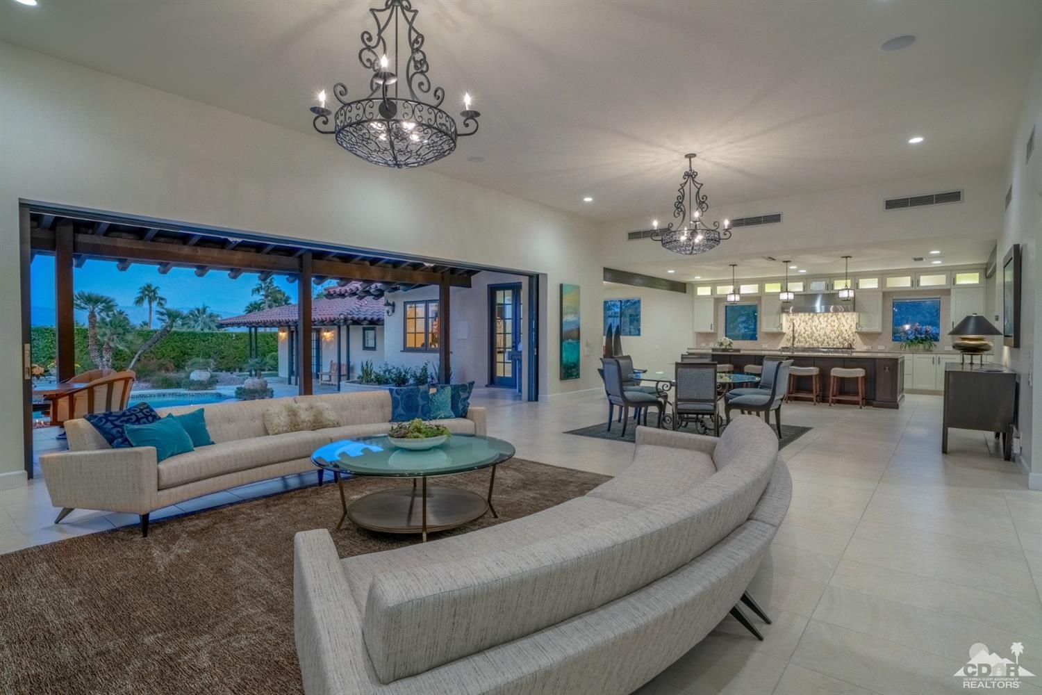 40757 Thunderbird Road Rancho Mirage, CA 92270 - Photo 3 of 70 a living room with furniture and a large window